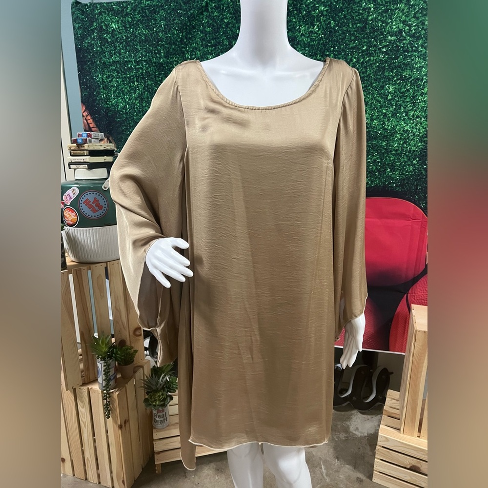 Gold winged dress by Uncle Frank
